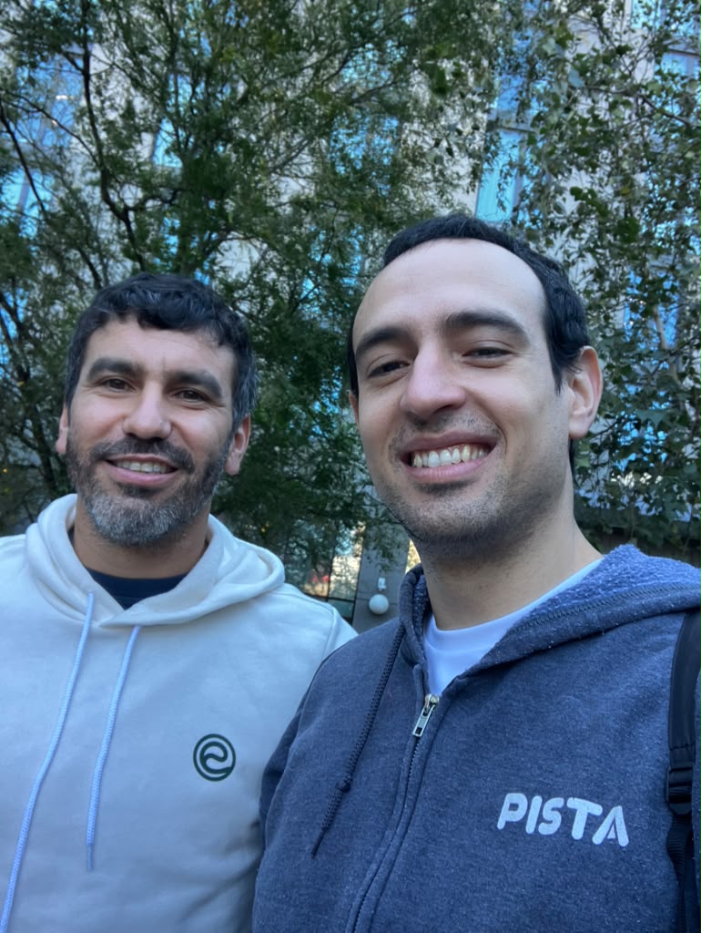 Selfie of Paulo with a friend outside, under trees